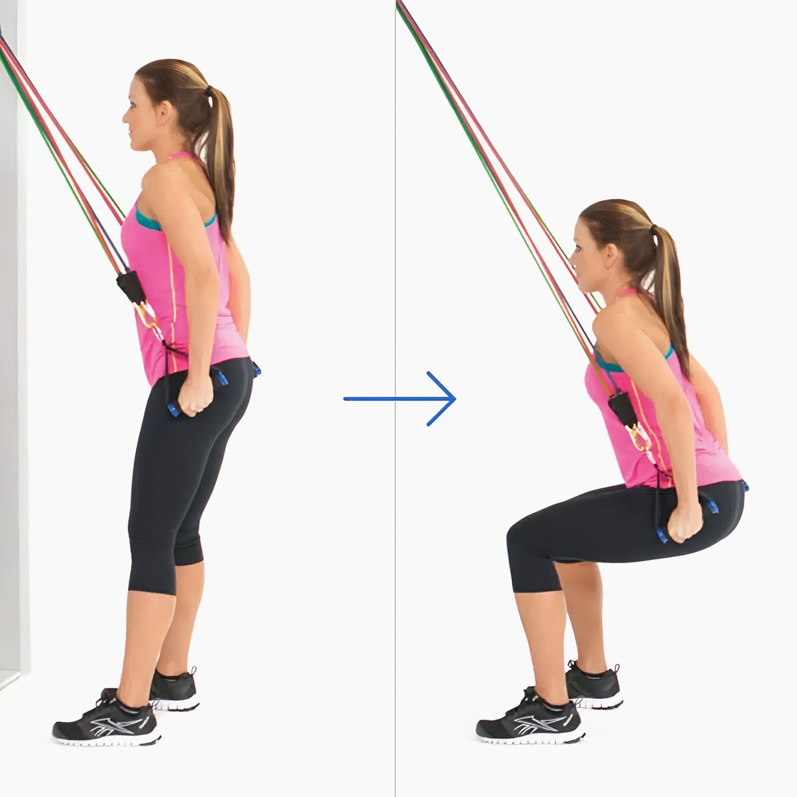 Woman with her back to a door holds handles at her hips, squatting back against bands anchored at the top of the door.